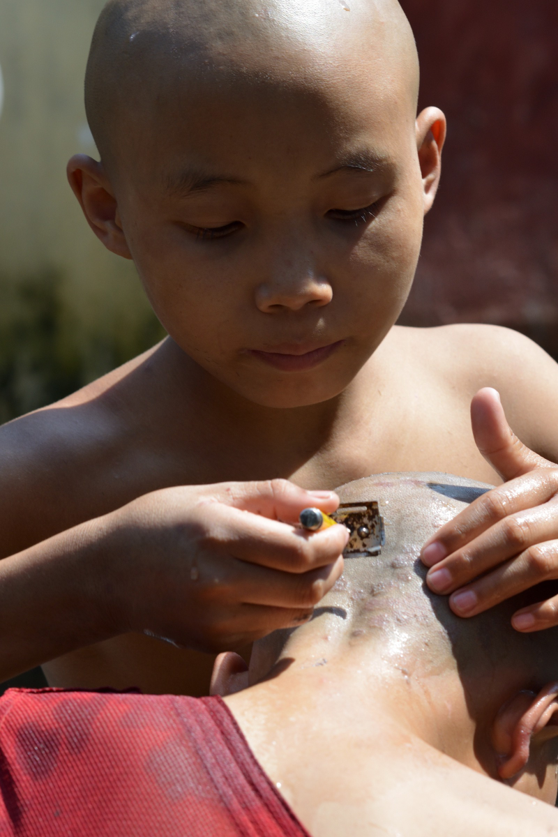 In Monasteries and Pagodas: head shaving in Naga Gu Monastery